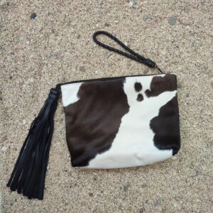 BIG CLUTCH IN bLACK AND WHITE COW HIDE