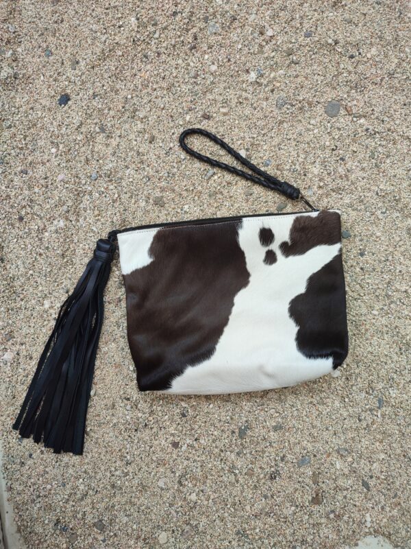 BIG CLUTCH IN bLACK AND WHITE COW HIDE